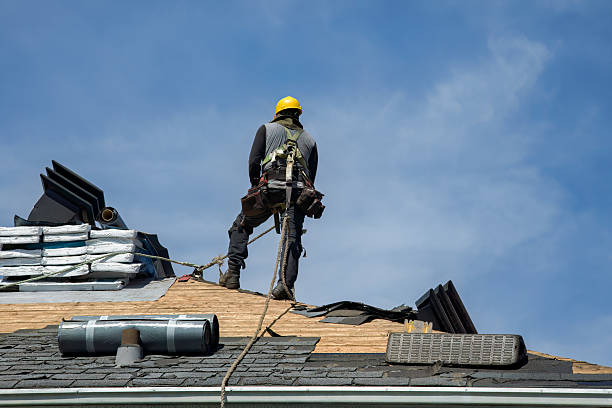 Professional Roofing technician working in Stevinson, CA